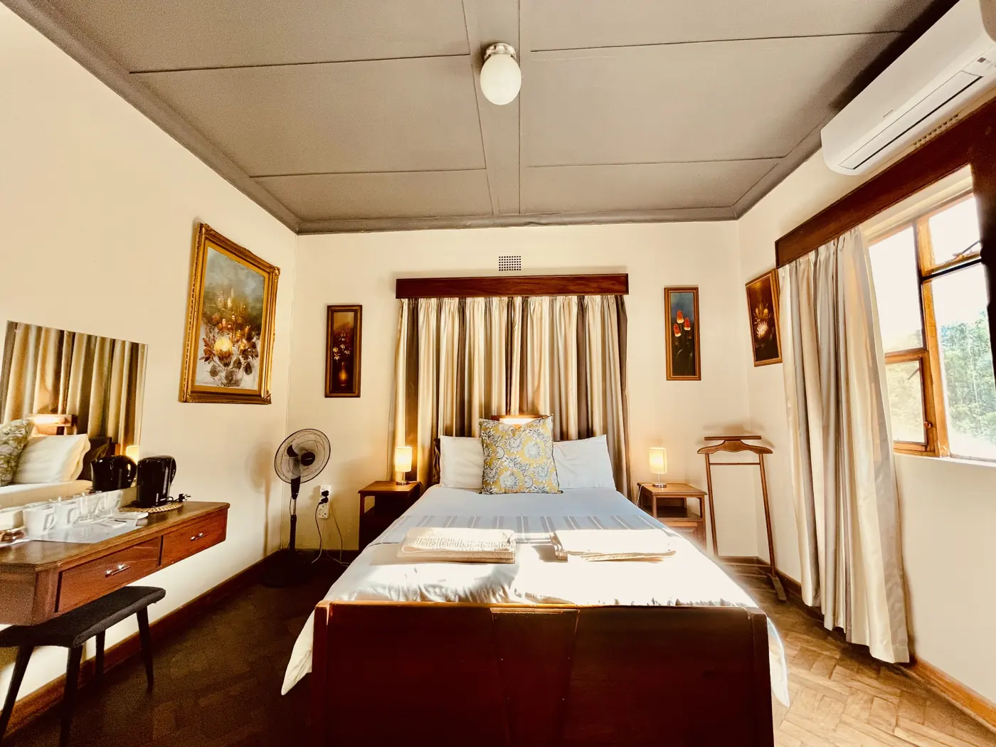 Queen bedroom with ensuite bathroom and vintage furnishings at Hotel De Rust, De Rust, Klein Karoo